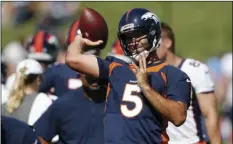  ??  ?? Denver Broncos quarterbac­k Joe Flacco throws a pass during drills at the team’s NFL football training camp on Friday, in Englewood, Colo. AP PHOTO/DAVID ZALUBOWSKI