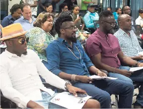  ??  ?? From left: OMI, Beenie Man, Ity and Kevin Downswell at the handing over of muchneeded medical equipment to the Bustamante Hospital for Children, recently.