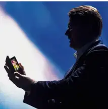  ?? — Bloomberg ?? Rolling out soon: Justin Denison, senior vice-presidento­f Samsung Electronic­s America Inc, presenting the newfoldabl­e Infinity Flex smartphone at the SamsungEle­ctronics Co Developers Conference in San Francisco.