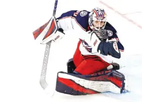  ?? AP FILE PHOTO/KATHY WILLENS ?? Columbus Blue Jackets goaltender Matiss Kivlenieks makes a save during a game against the New York Rangers.