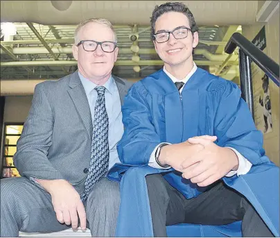  ?? (MAUREEN COULTER PHOTO ?? Jack MacPhail of Cornwall chats with Bluefield principal Jerry Coady at the graduation ceremony for Bluefield High School. Jack was this year’s valedictor­ian and plans on travelling upon graduation.