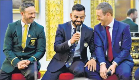  ?? GETTY IMAGES ?? Spirit of cricket: (From left) skippers AB de Villiers, Virat Kohli and Eoin Morgan during the ICC champions dinner in London on Wednesday.