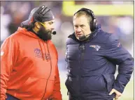  ?? Steven Senne / Associated Press ?? In this Nov. 3, 2013, file photo, then-New England Patriots defensive coordinato­r Matt Patricia, left, listens to head coach Bill Belichick in the fourth quarter of a game in Foxborough, Mass.