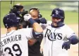  ?? Sean M. Haffey / TNS ?? The Rays’ Mike Zunino, right, celebrates a solo home run with teammate Kevin Kiermaier on Saturday.