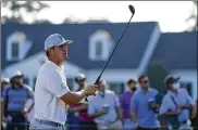  ?? DAVID J. PHILLIP / AP ?? Bryson DeChambeau watches his tee shot on the 10th hole during a practice round for the Masters on Wednesday in Augusta, Ga.