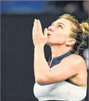  ??  ?? Simona Halep celebrates after her first round win