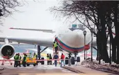  ?? AP ?? ■ A plane which carried Russian diplomats and their family members ordered to leave the US after landing at Vnukovo 2 government airport outside Moscow yesterday.