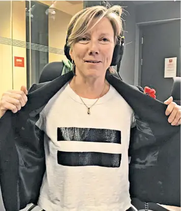  ??  ?? Radio 4 presenter Sarah Montague makes her point on gender pay equality with a shirt emblazoned with an equals symbol