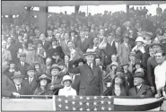  ?? AP File Photo ?? President Calvin Coolidge throws out the ball for the opening game of the 1924 World Series between the Washington Senators and the New York Giants in Washington on Oct. 4, 1924.