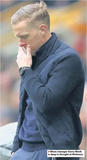  ??  ?? >
Blues manager Garry Monk is deep in thought at Molineux