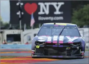  ?? THE ASSOCIATED PRESS ?? In this Aug. 3, 2019, file photo, Jimmie Johnson (48) drives through the area of the course called “The Bus Stop” during a practice run for the NASCAR Cup Series auto race at Watkins Glen Internatio­nal, in Watkins Glen, N.Y.