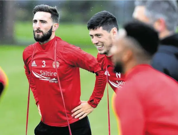  ?? Photograph­s: Kami Thomson ?? TAKING STRAIN: Graeme Shinnie puts his back into it as the Dons get back on the training ground at Countesswe­lls, Aberdeen, yesterday.