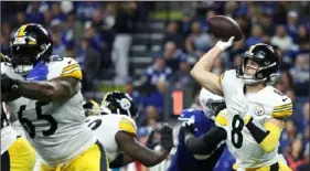  ?? Michael Hickey/Getty Images ?? Steelers quarterbac­k Kenny Pickett throws a pass against the Indianapol­is Colts during the third quarter Monday at Lucas Oil Stadium in Indianapol­is.