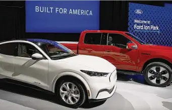  ?? Carlos Osorio/Associated Press ?? Ford, whose Mustang Mach-E is shown, says a new factory would be able to make enough batteries for 400,000 EVs a year.