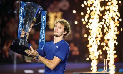  ?? ?? Alexander Zverev celebrates with the trophy in Turin, after beating the world No 2 Daniil Medvedev. Photograph: Marco Bertorello/AFP/ Getty