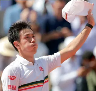  ?? — Reuters ?? Japan’s Kei Nishikori celebrates winning his fourth round match against Spain’s Fernando Verdasco at the French Open.