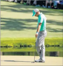  ?? ASSOCIATED PRESS—CHARLES RIEDEL ?? Sergio Garcia pauses on the 15th green during Thursday’s first round at the Masters golf in Augusta, Ga. Garcia shot an 8-over 13 on the hole