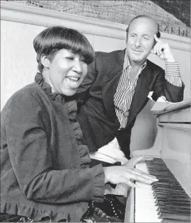  ?? Roger Ressmeyer ?? SINGER ARETHA FRANKLIN and music mogul Clive Davis in 1981 in a scene from the new documentar­y film “Clive Davis: The Soundtrack of Our Lives.”
