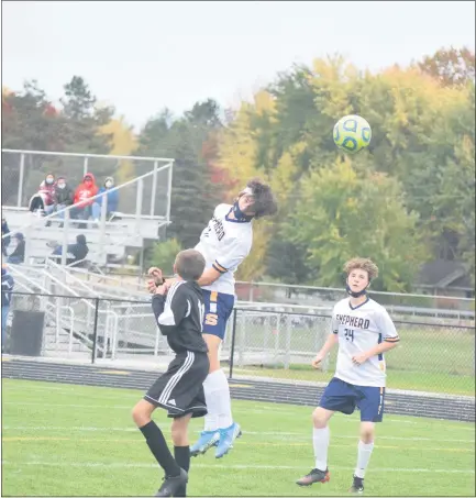  ?? JIM LAHDE — THE MORNING SUN ?? Shepherd’s Zach Bendele scored the second goal of Wednesday’s game in Midland via a header off a corner kick.