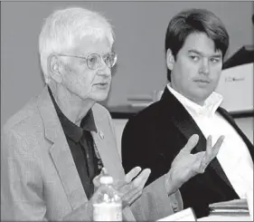  ?? LYNN KUTTER ENTERPRISE-LEADER ?? State Rep. Uvalde Lindsey answers questions at a meet-and-greet session Thursday with legislator­s, legislativ­e candidates and area school officials. Lindsey is running opposed for state Senate in November. Rep. Duncan Baird sits next to Lindsey.