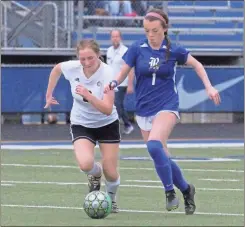  ?? Scott Herpst ?? Ringgold’s Alayna Custer moves the ball upfield against Rockmart on Friday night. The Lady Tigers stayed unbeaten on the season with a 5-2 victory.