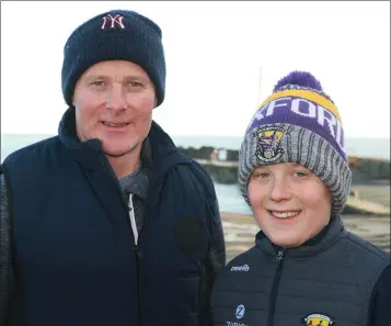  ??  ?? Alan Walker with his son John taking part in the Ballygarre­tt Tidy Towns/Operation Transforma­tion walk in Cahore recently.