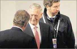  ?? JOHANNES SIMON / GETTY IMAGES ?? Secretary of Defense James Mattis (center) arrives Friday for the 2017 Munich Security Conference. U.S. officials at the conference are reportedly scrambling to reassure European counterpar­ts that they remain staunch allies in the wake of calls by...