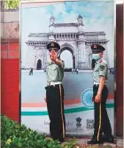  ?? AFP ?? Two Chinese paramilita­ry police officers patrol outside the Indian embassy in Beijing yesterday.