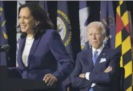  ?? Oliver Douliery AFP/Getty Images ?? VICE PRESIDENT Kamala Harris and President Biden spent much of their time together in the administra­tion’s early months as COVID-19 limited travel.