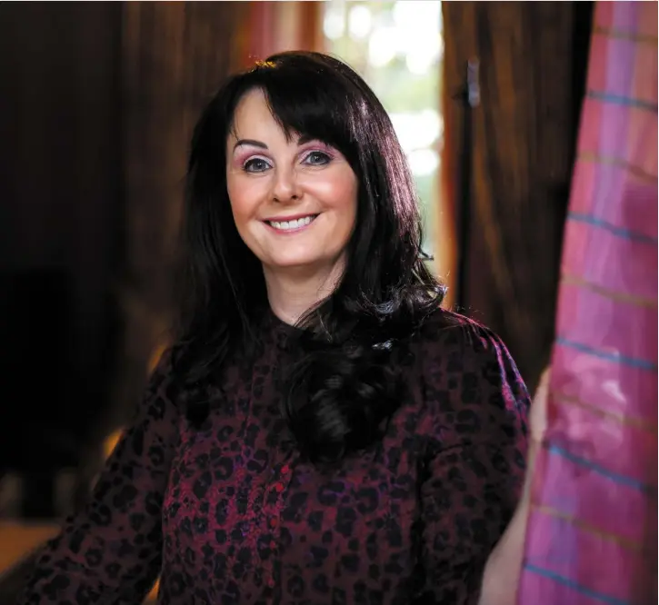  ??  ?? Bestsellin­g novelist and non-fiction writer Marian Keyes pictured at her home where she has taken to oil painting (her work far left). Her novels (inset below) including her latest Grown Ups Pic: Mark Condren