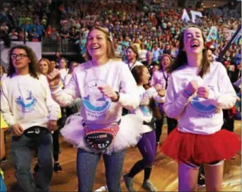  ??  ?? Penn State Brandywine dancers Matt Hoyer, Alexa Anderson and Annie Ward were among more than 700 Penn State students who went 46 hours without sitting or sleeping at THON 2018 to raise funds to battle pediatric cancer. This year, THON raised $10,151,663.93, with Brandywine’s THON group contributi­ng $29,600.80. The event was held Feb. 16-18 in the Bryce Jordan Center at University Park.