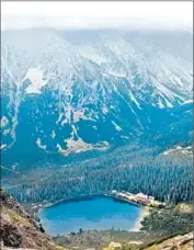  ?? John Henderson ?? THE HIGH TATRAS of Slovakia, popular with hikers, deliver big views. This view: Popradske Pleso.
