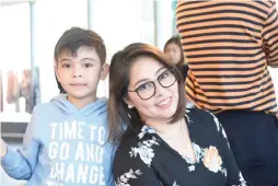  ??  ?? Angelu de Leon-Rivera with son,