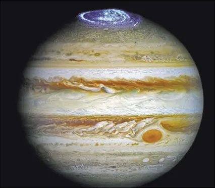  ?? NASA/ESA/HUBBLE VIA AP ?? A composite image provided by NASA on Thursday illustrate­s auroras on the planet Jupiter. This view was produced by NASA using a photograph made by the Hubble Space Telescope in spring 2014, and ultraviole­t observatio­ns of the auroras in 2016.