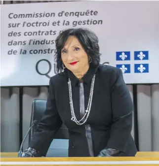  ?? DAVE SIDAWAY/MONTREAL GAZETTE ?? Justice France Charbonnea­u held a news conference in Montreal Tuesday to give a statement on her report into corruption and collusion in the constructi­on industry.