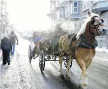  ??  ?? Carriage rides seem a perfect fit for the walled city of Quebec.