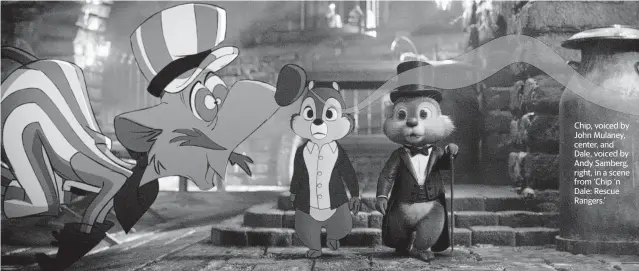  ?? ?? Chip, voiced by John Mulaney, center, and Dale, voiced by Andy Samberg, right, in a scene from ‘Chip ‘n Dale: Rescue Rangers.’
