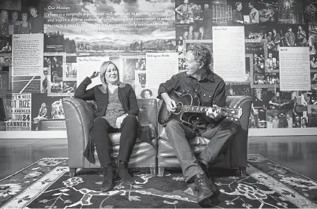  ?? Timothy Hurst, Daily Camera ?? Co-founders Helen and Nick Forster sit at eTown on March 8 in Boulder. “You know, we really didn’t think about the long term or the phenomenal growth eTown has seen when we began eTown,” Helen said.