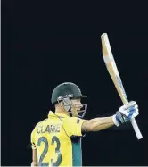  ?? Photos: GETTY IMAGES, REUTERS ?? Steve Smith and Shane Watson celebrate Australia surpassing New Zealand’s total, a victory set up in a big way by captain Michael Clarke’s fine knock of 74. ONLINE For more coverage and analysis of last night’s Cricket World Cup final go to stuff.co.nz.