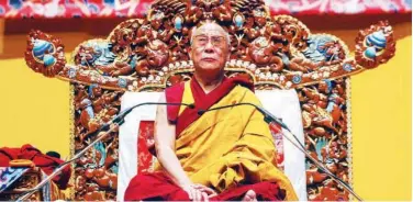  ?? Agence France-presse ?? ↑ Dalai Lama concentrat­es before a group meditation.