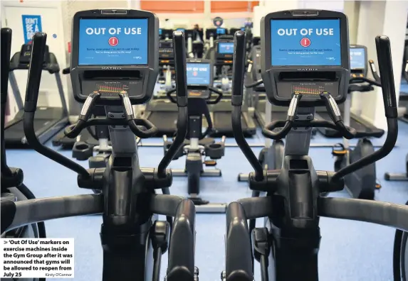  ?? Kirsty O’Connor ?? ‘Out Of Use’ markers on exercise machines inside the Gym Group after it was announced that gyms will be allowed to reopen from July 25