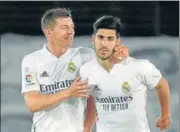  ?? AFP ?? Real's Marco Asensio (R) celebrates his goal with Toni Kroos.