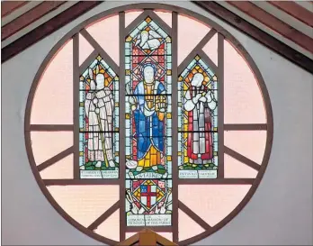  ?? PHOTO / JACK PENMAN ?? Stained glass window at the St Luke’s Church altar. Left is Wi Parata Te Kakakura. Faithful servant of God. Middle St Luke. Right In memory of Octavious Hadfield. Maori missionary in this district.