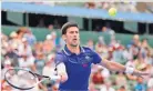  ??  ?? DANIEL POCKETT/GETTY IMAGES Novak Djokovic wears a full arm sleeve to protect his elbow at the Kooyong Classic exhibition tournament in Australia on January 10, 2018.