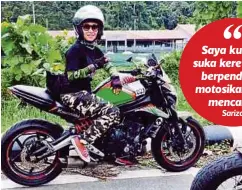  ??  ?? SARIZA bersama motosikal berkuasa tinggi miliknya.