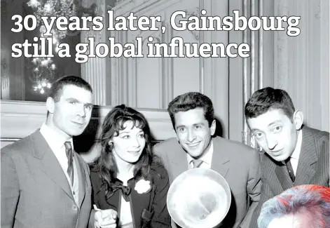  ?? — AFP photos ?? File photo shows March 14, 1959 French singer Juliette Greco (second left) congratula­tes the laureates of the Academie Charles-Cros music award, Jacques Dufilho (left), Marcel Amont (second right) and Serge Gainsbourg (right) at the Palais d’Orsay in Paris. March 2, 2021 marked the 30th anniversar­y of Serge Gainsbourg’s death.