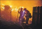  ?? Marcus Yam Los Angeles Times ?? THE HILLSIDE fire in San Bernardino was one of several wildfires burning in California last week.