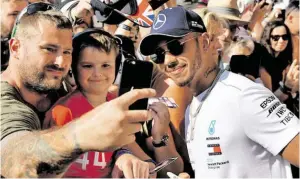  ?? BILD: SN/APA/AFP/ANDREJ ISAKOVIC ?? Lewis Hamilton genießt sein britisches Heimspiel.