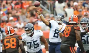  ?? JOHN KUNTZ/TRIBUNE NEWS SERVICE ?? Tennessee Titans quarterbac­k Marcus Mariota (8) makes a pass against the Cleveland Browns on September 8, 2019, at FirstEnerg­y Stadium. Mariota signed with the Las Vegas Raiders this week.