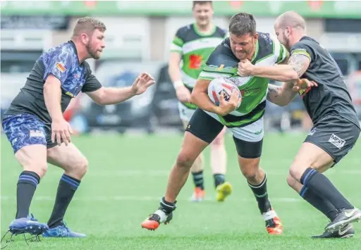  ?? CHRIS POWELL ?? Action from Rhondda Outlaws v Cardiff Blue Dragons